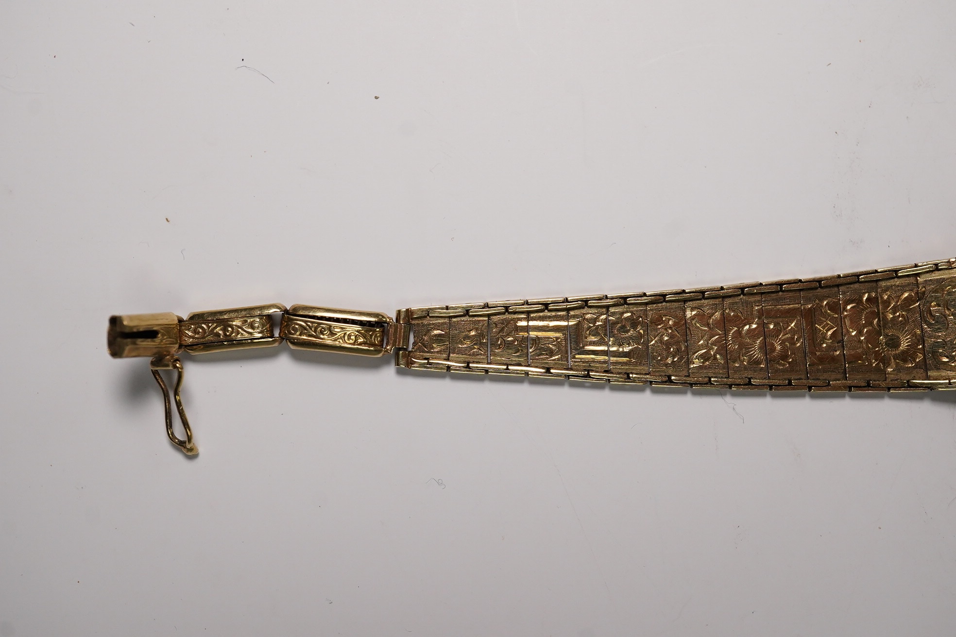 A lady's 14k manual wind wrist watch, on a 14k bracelet, gross weight 14 grams. Condition - poor to fair